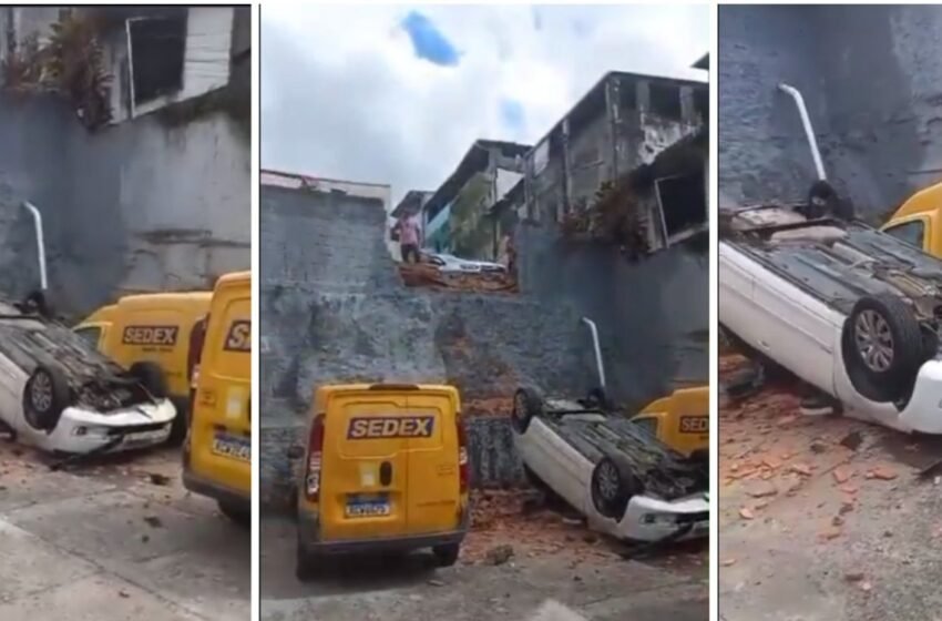  Carro capota e atinge estacionamento dos Correios no Garcia